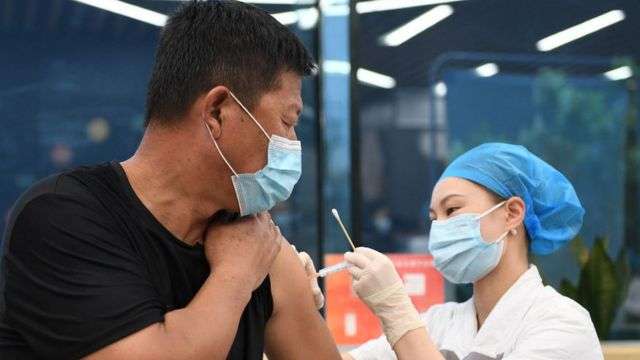 Man receiving Covid vaccine in Hangzhou, Zhejiang province