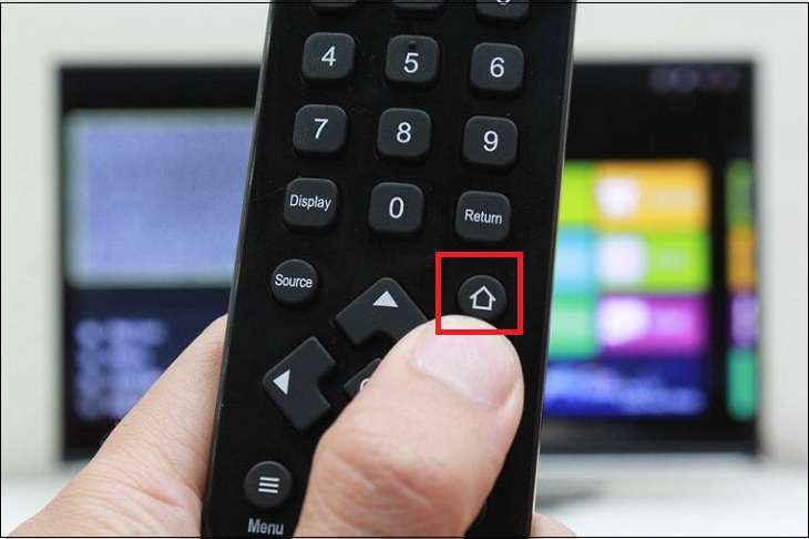 Nhấn nút Home trên remote tivi.